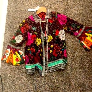 Alice and Olivia blouse is brand new.Size x small.